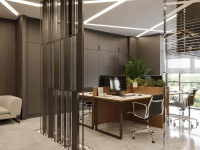By means of the metal space divider we designed to gracefully separate the reception foyer from the active workstations, we endowed the spatial narrative of the office with a strong sense of identity. With the pebble-filled water feature application we implemented at the floor level, we aimed to conceptualize this partitioning element not merely as an ordinary furniture piece, but as a structural architectural component. Furthermore, by generating storage solutions through custom-manufactured integrated cabinetry systems positioned along the entryway facade, we optimized the square footage with maximum efficiency, thereby reaffirming our office interior design approach that stands out among the best interior design companies.