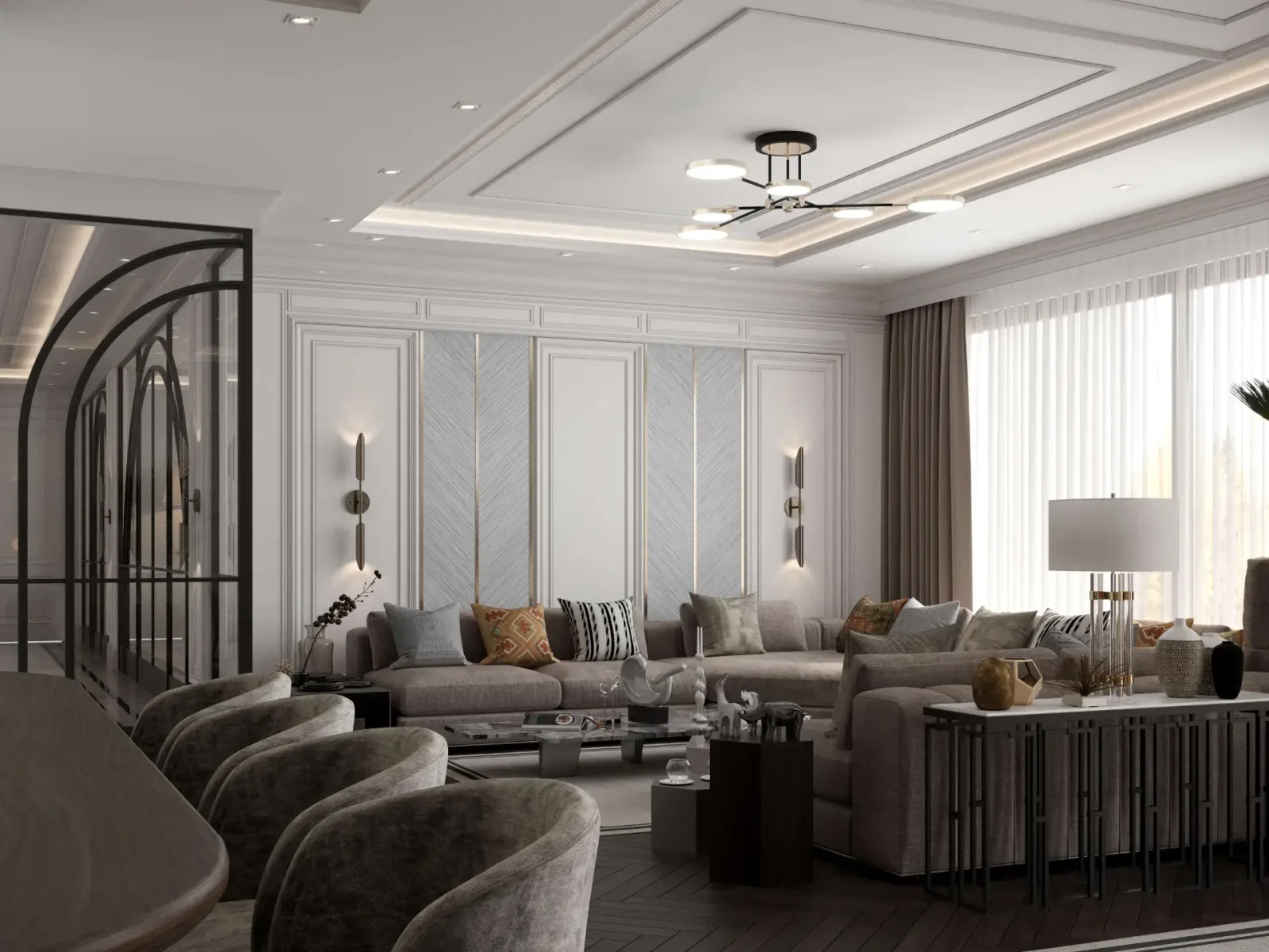 The concealed lighting coves and pendant lighting elements we designed in the living room, along with the elegant wall…