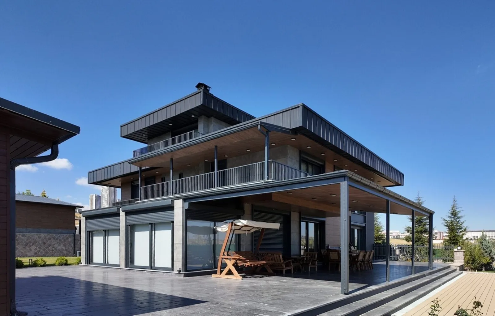 Standing out with its contemporary architecture, this residence dazzles with its massive outdoor areas. The spacious…