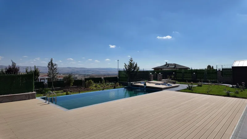 Located on the terrace, the lake-view infinity pool flawlessly mirrors the harmony between water and sky. Where our client…