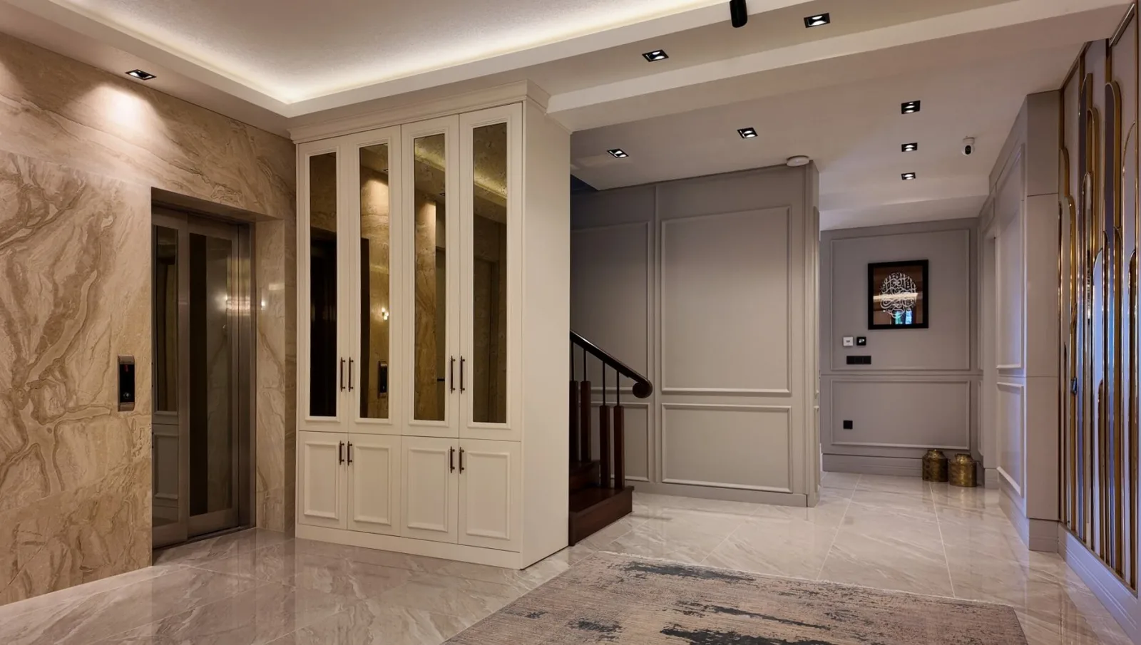 In the entryway and elevator zone of the home, we aimed to display a minimalist yet distinguished style. During our villa…