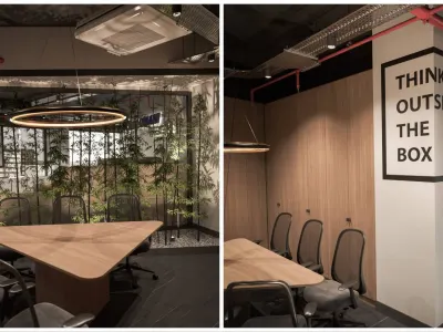 In our office interior design projects, our triangular meeting room, enhanced by a lush indoor garden, clearly demonstrates our determination to move beyond standards by taking our spatial organization to a completely different dimension. While its unconventional geometric structure and sharp lines create a lasting visual impact, we have balanced the high energy of the room with a serene oasis thanks to this green space we curated, bringing a natural tranquility to the atmosphere of the interior.