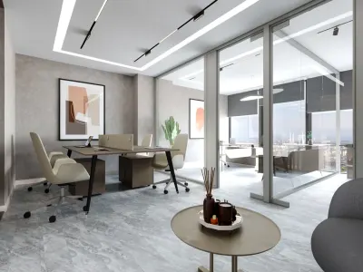 As a corporate interior architecture office, we curated our color palette in our office interior design projects to maximize the natural daylight pouring through the expansive facade windows; accordingly, we preferred soft, neutral tones such as beige, gray, and off-white. We avoided clutter on the wall surfaces by incorporating carefully selected minimalist abstract artworks, thereby infusing the space with a sophisticated character without overwhelming it. In our furniture selection, we adopted elegant, unobtrusive lines and utilized the textural richness of high-end natural materials such as wood and metal. In the area designated as an open-plan office, we positioned our large-scale work desk, which accommodates multiple workstations, along the wall line to optimize circulation paths and highlighted this zone with pendant lighting.